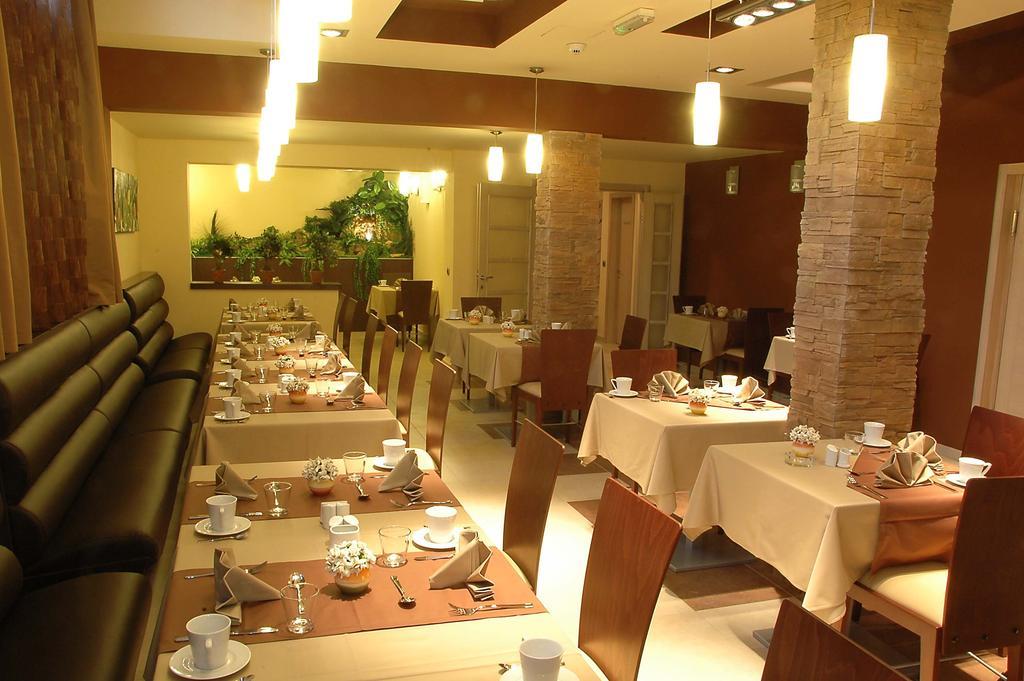 Garni Vigor - Ev Station Hotel 2*